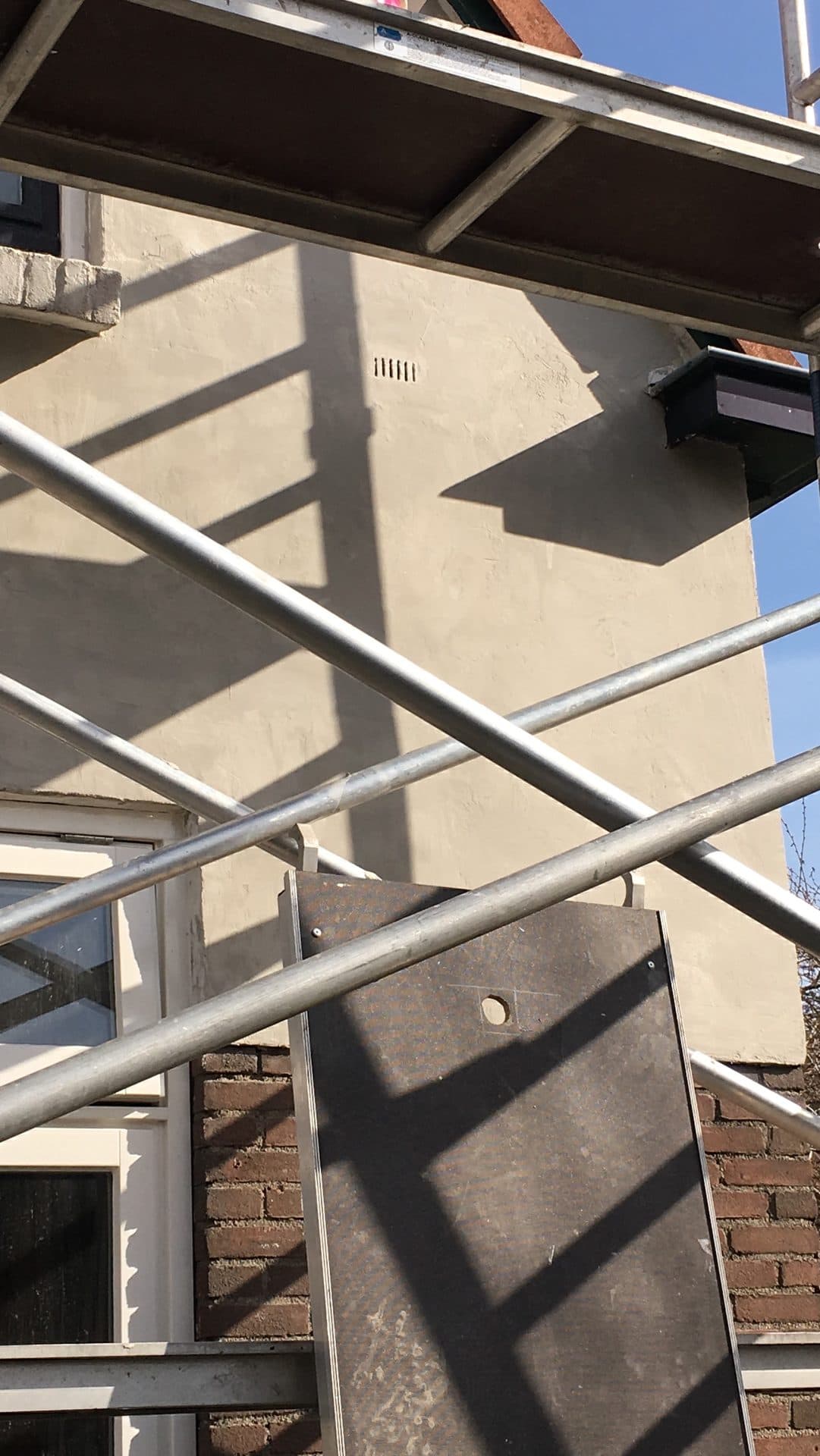 Buitenschilderwerk met hoogwerker
